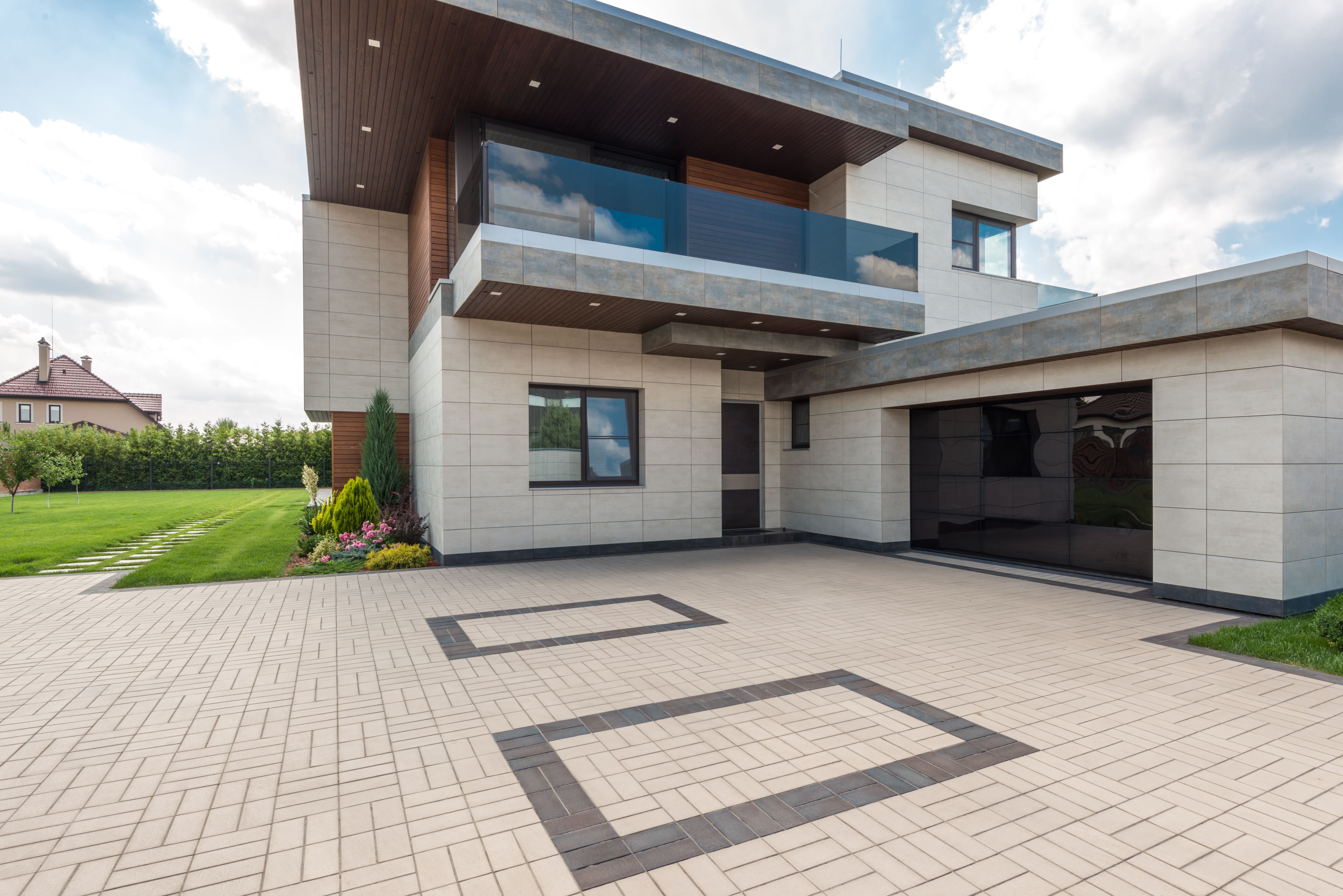 Modern home exterior in daylight before twilight enhancement